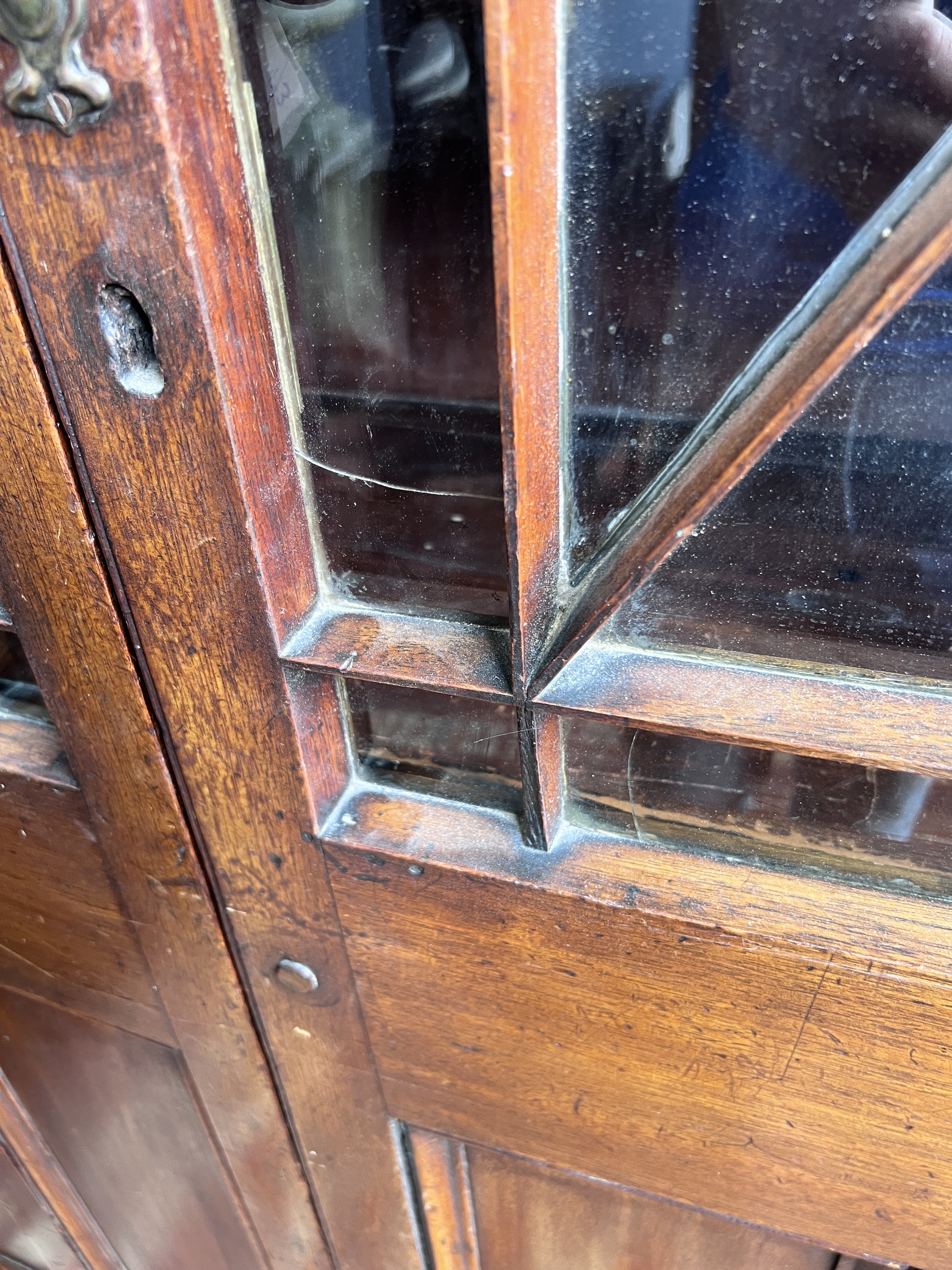 A Victorian glazed mahogany bookcase, length 120cm, depth 39cm, height 228cm